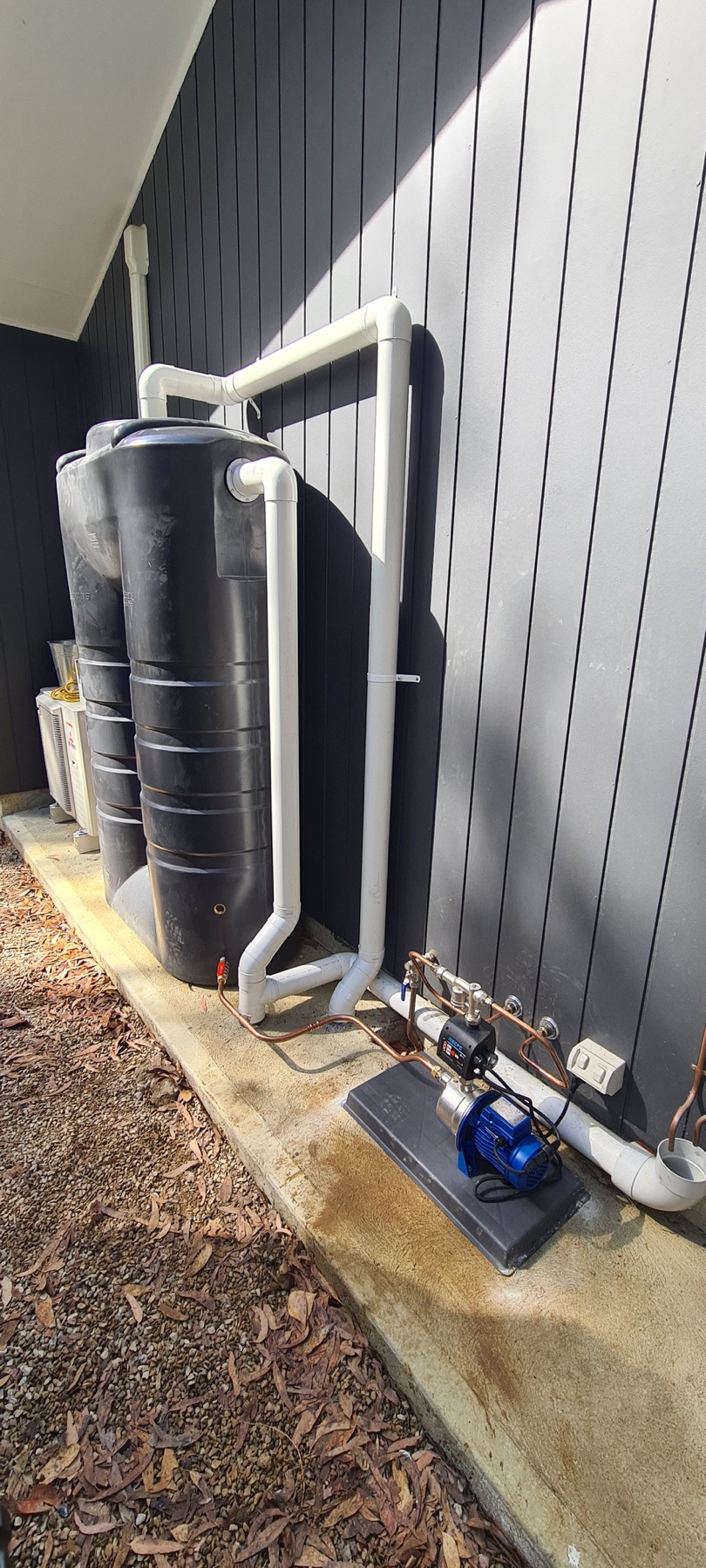 Rainwater tanks, pump and connected exterior pipework